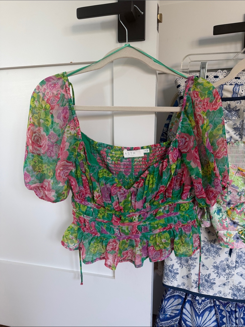 Astr Floral Puff Sleeve Smocked Peplum Top in Green & Pink
